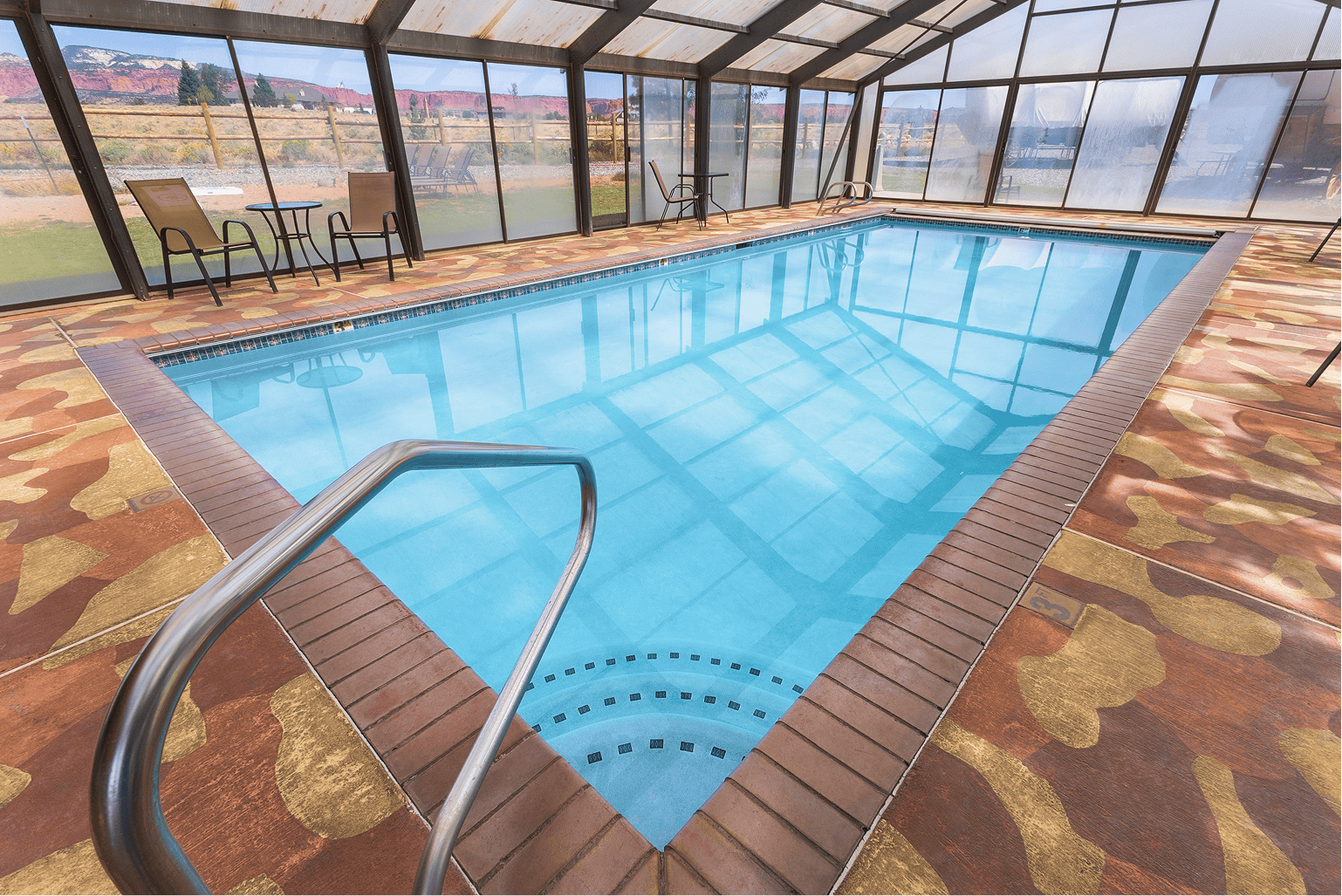 The indoor pool and hot tub at Broken Spur Inn